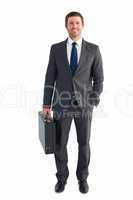 Businessman standing with his briefcase