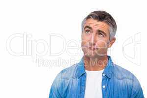 Confused man with grey hair thinking