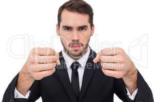 Exasperated businessman with clenched fists