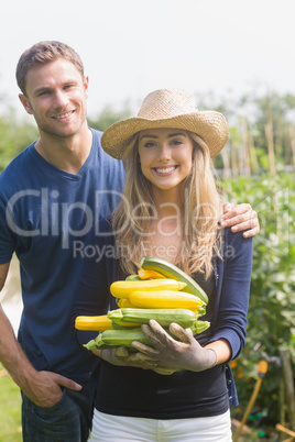 Cute couple gardening on sunny day