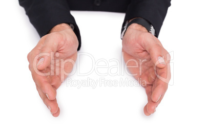 Close up of businessman with hands spread on the floor