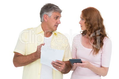 Casual couples working out their bills