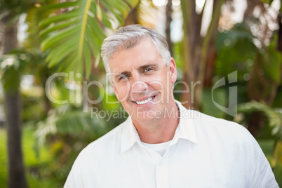 Casual man smiling at camera