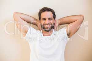 Happy man sitting on floor