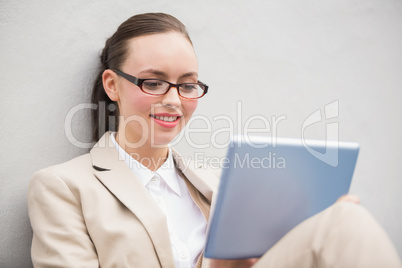 Young businesswoman using tablet pc