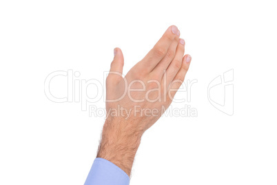 Businessman holding hand out in presentation