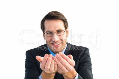 Businessman holding his hands out