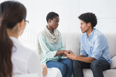 Reconciled couple smiling at each other