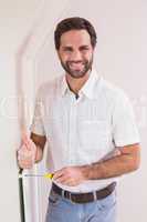 Handyman hanging up a radiator