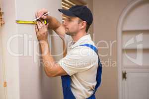 Construction worker using spirit level