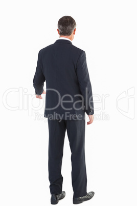 Elegant businessman standing and gesturing