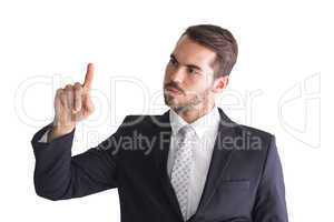 Thoughtful businessman pointing something with his finger