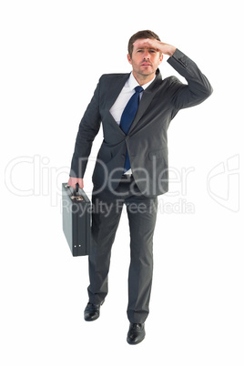 Businessman looking with his briefcase