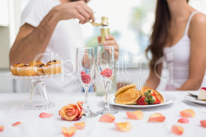 Young couple having a romantic breakfast