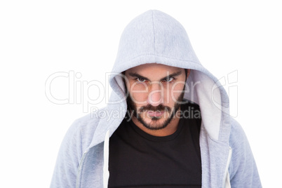 Portrait of dangerous man wearing hooded jacket