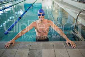Fit swimmer in the pool at leisure center