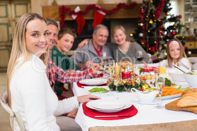 Three generation family having christmas dinner together