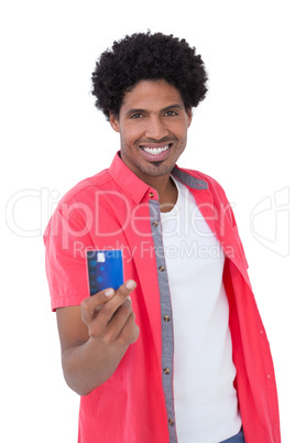 Happy man showing credit card