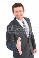 Businessman smiling and offering his hand