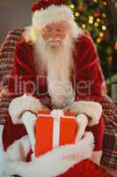 Portrait of santa stocking gifts in his sack