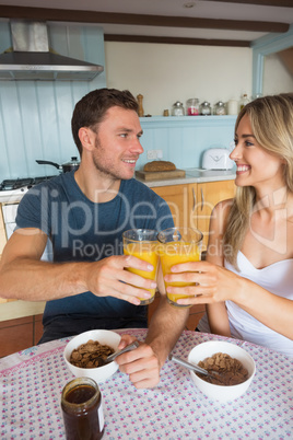 Cute couple having breakfast together