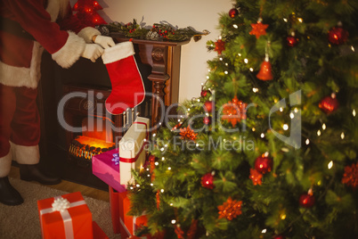 Father christmas stocking gifts at christmas eve