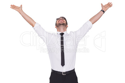 Cheering businessman with his arms raised up