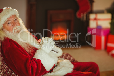 Santa claus relaxing on the couch