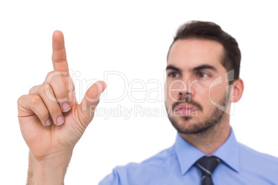 Businessman measuring something with his fingers