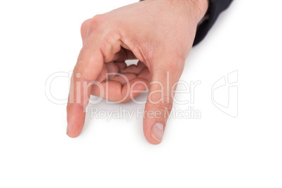 Businessman measuring something with his fingers