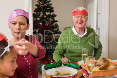 Family in party at christmas dinner