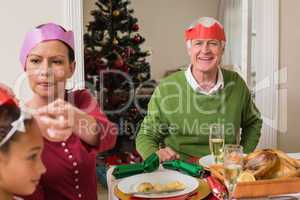 Family in party at christmas dinner