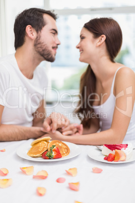 Young couple having a romantic breakfast