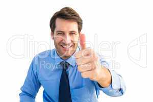 Smiling businessman gesturing thumbs up