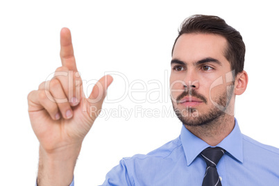 Businessman measuring something with his fingers