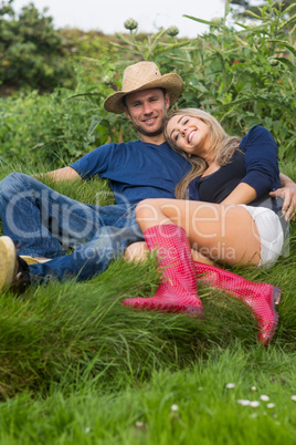 Cute couple relaxing on the grass