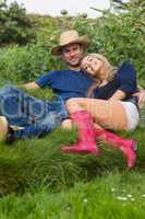 Cute couple relaxing on the grass