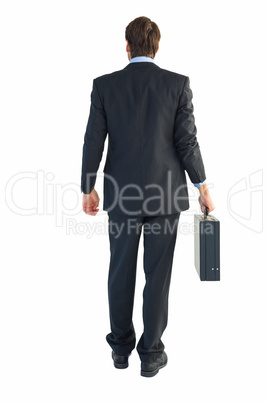 Rear view of businessman holding a briefcase