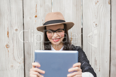 Pretty hipster using tablet pc