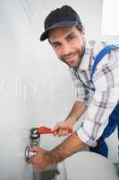 Plumber fixing tap with wrench