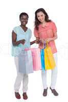 Female friends holding shopping bags