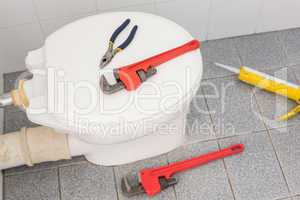 Plumbing tools on the toilet