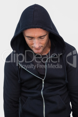 Portrait of a burglar in hood jacket