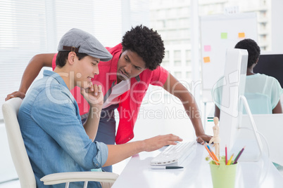 Young creative man working at desk