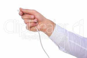Close up of businessmans hand holding cable