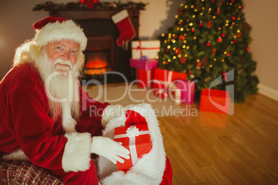 Cheerful santa claus stocking gifts