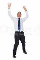 Businessman standing with arms up