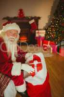 Smiling father christmas stocking presents