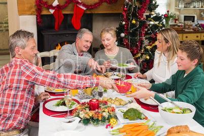 Three generation family having christmas dinner together