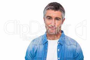 Portrait of a unsure man in casual clothes